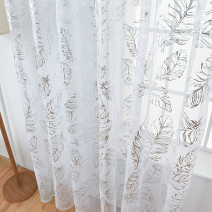 Visillo blanco con plumas doradas