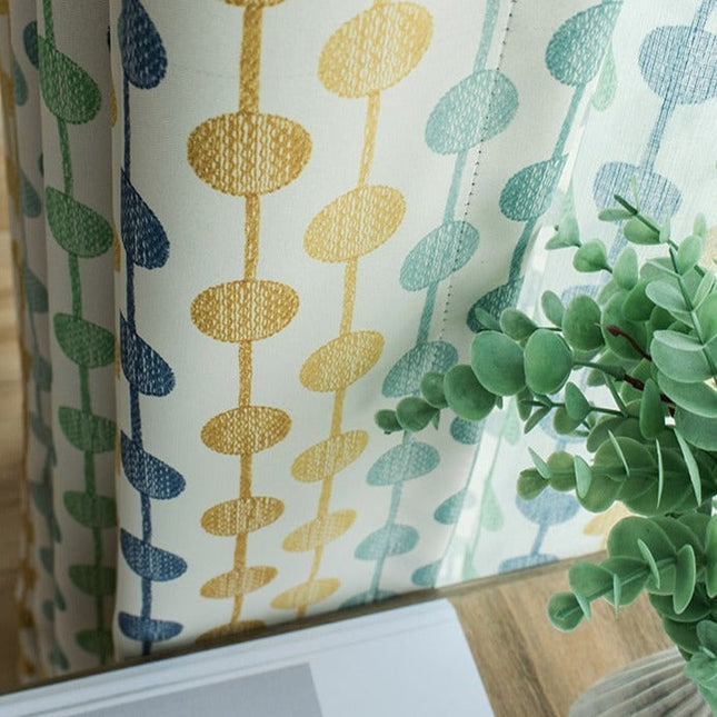 Cortina moderna verde con estampado