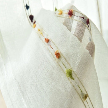 Visillo de lino con pompones