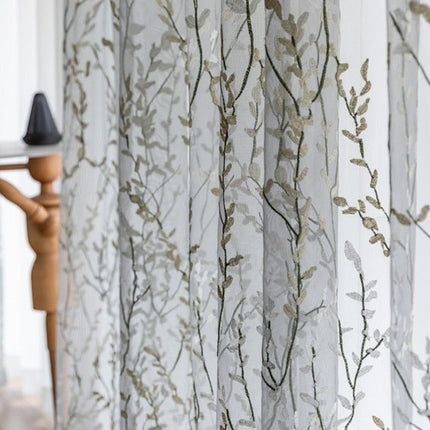 Visillo bordado con ramas de árbol