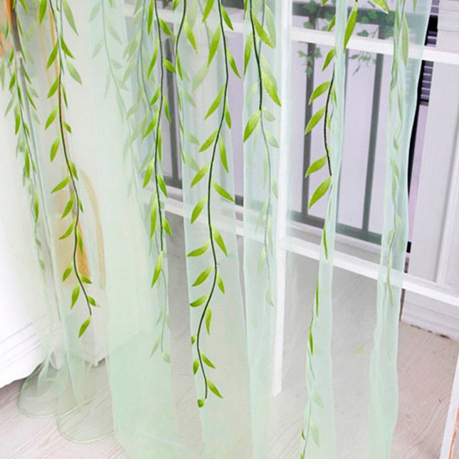 Visillo translúcido con hojas colgantes