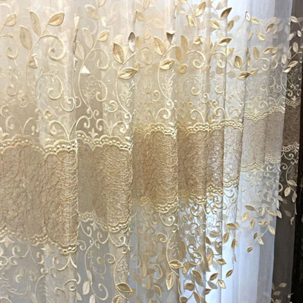 Visillo bordado con enredaderas doradas