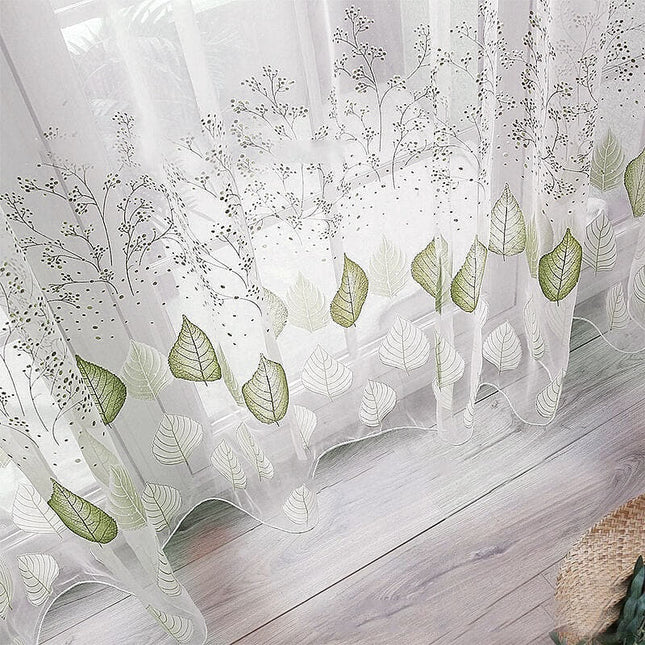 Visillo verde bordado con hojas