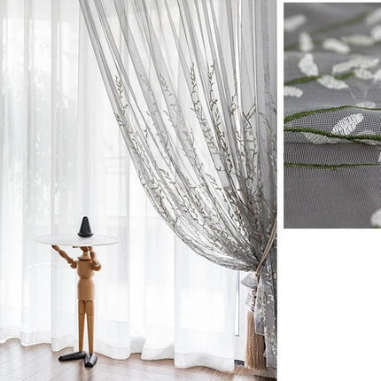 Visillo bordado con ramas de árbol