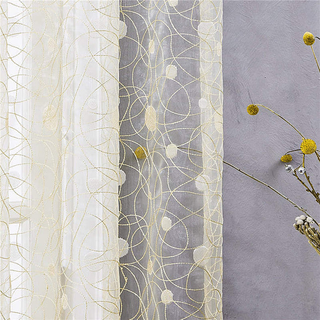 Visillo beige bordado con ramas
